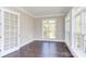 Bright home office features hardwood floors, large windows, and built-in shelving at 0001 Bolton Rd, Catawba, NC 28609