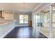 Breakfast nook with hardwood floors and sliding doors leading to a screened porch at 0001 Bolton Rd, Catawba, NC 28609