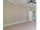 Spacious bedroom with ceiling fan and carpet flooring at 111 Church St, Chester, SC 29706