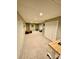 Finished basement with neutral carpeting and lots of storage at 142 Scotland Dr, Mooresville, NC 28115