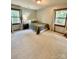Bright bedroom with wood floors and ample natural light at 142 Scotland Dr, Mooresville, NC 28115