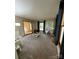 Spacious living room with hardwood floors and large windows at 142 Scotland Dr, Mooresville, NC 28115