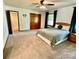 Large bedroom with ample closet space and carpet flooring at 142 Scotland Dr, Mooresville, NC 28115
