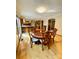 Formal dining area with hardwood floors and a round table at 142 Scotland Dr, Mooresville, NC 28115