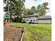 Spacious backyard with playground and large home at 142 Scotland Dr, Mooresville, NC 28115