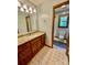 Clean bathroom with granite vanity and tile flooring at 142 Scotland Dr, Mooresville, NC 28115
