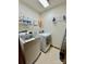 Laundry room with washer, dryer, and shelving at 142 Scotland Dr, Mooresville, NC 28115