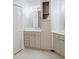 Elegant bathroom with double vanity, marble countertops, and updated cabinetry at 4905 Benthaven Ln # 321, Charlotte, NC 28269