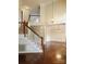Two-story foyer with hardwood floors and elegant staircase at 4905 Benthaven Ln # 321, Charlotte, NC 28269