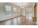 Dining room with hardwood floors, lots of windows, and access to a deck at 0002 Bolton Rd, Catawba, NC 28609