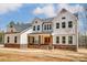 Stunning farmhouse-style home with stone accents at 0002 Bolton Rd, Catawba, NC 28609