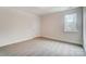 Spacious bedroom with neutral carpeting and a window at 0002 Bolton Rd, Catawba, NC 28609