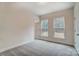 Bright bedroom with neutral carpeting and two windows at 0002 Bolton Rd, Catawba, NC 28609