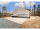 White house with attached two-car garage and paved driveway at 0002 Bolton Rd, Catawba, NC 28609