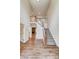 Grand entryway with hardwood floors, staircase, and views to the living room at 0002 Bolton Rd, Catawba, NC 28609