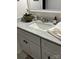 Bathroom with marble countertop and white cabinets at 6132 Heath Ridge Ct, Charlotte, NC 28210