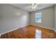 Bright bedroom with wood flooring and ceiling fan at 6902 Neuhoff Ln, Charlotte, NC 28269