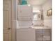 Convenient laundry room with stackable washer and dryer at 8909 Highway 218 Hwy, Marshville, NC 28103