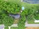Aerial view of home nestled amongst trees at 8909 Highway 218 Hwy, Marshville, NC 28103