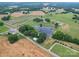 Aerial view showing home, pond, and surrounding area at 8909 Highway 218 Hwy, Marshville, NC 28103