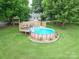 Above-ground pool with surrounding deck at 8909 Highway 218 Hwy, Marshville, NC 28103