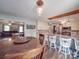 Kitchen boasts a large island, dining area, and views into the living room at 8909 Highway 218 Hwy, Marshville, NC 28103