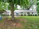 Spacious backyard with patio and string lights at 8909 Highway 218 Hwy, Marshville, NC 28103