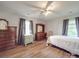 Well-lit bedroom with hardwood floors and ample closet space at 8909 Highway 218 Hwy, Marshville, NC 28103