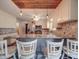 Kitchen with granite countertops, white cabinets, and wood ceiling at 8909 Highway 218 Hwy, Marshville, NC 28103
