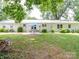 Large backyard with patio, seating area, and plenty of grass space at 8909 Highway 218 Hwy, Marshville, NC 28103