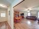 Open dining area with hardwood floors and view into living room at 8909 Highway 218 Hwy, Marshville, NC 28103