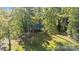 Ranch style home surrounded by lush green trees at 201/215 Smithfield Dr, Charlotte, NC 28270