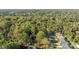 Aerial view of a residential neighborhood with lush trees and houses at 201/215 Smithfield Dr, Charlotte, NC 28270
