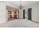 Bright dining area with kitchen access and backyard view at 4803 Roxfield Ln, Charlotte, NC 28215