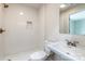 Modern bathroom with white subway tile, updated vanity, and shower at 1571 S Aspen St, Lincolnton, NC 28092