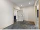 Unfinished basement with concrete floors and open space at 7504 Greedy Hwy, Hickory, NC 28602