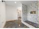 Modern bathroom with a large marble shower and concrete floors at 7504 Greedy Hwy, Hickory, NC 28602