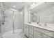 Modern bathroom with double vanity and a large shower at 1134 Keydet Dr, Charlotte, NC 28216