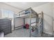 bedroom with a built-in bunk bed and ample storage at 1134 Keydet Dr, Charlotte, NC 28216