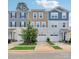 Three-unit townhome building with attached garages at 1134 Keydet Dr, Charlotte, NC 28216