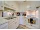 Bright kitchen with white cabinets and stainless steel appliances at 8510 Olive Branch Rd, Marshville, NC 28103