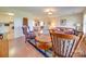 Cozy living room with hardwood floors, comfy seating, and a view to the kitchen at 8510 Olive Branch Rd, Marshville, NC 28103