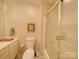 Clean bathroom with a toilet, tub and shower combo at 8510 Olive Branch Rd, Marshville, NC 28103