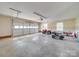 Spacious two-car garage with overhead storage at 8510 Olive Branch Rd, Marshville, NC 28103