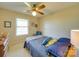 Well-lit bedroom with a comfortable bed and ceiling fan at 8510 Olive Branch Rd, Marshville, NC 28103