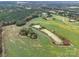 Aerial showing property with two ponds and surrounding land at 8510 Olive Branch Rd, Marshville, NC 28103