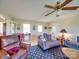 Living room with two sofas, a coffee table, and a ceiling fan at 8510 Olive Branch Rd, Marshville, NC 28103