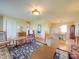Spacious living room with hardwood floors, comfortable seating, and views of the kitchen at 8510 Olive Branch Rd, Marshville, NC 28103