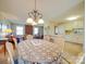 Charming dining room features a lovely table setting and a chandelier at 8510 Olive Branch Rd, Marshville, NC 28103