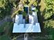 Bird's eye view of a home with a pool and detached garage at 501 Journey Sw St, Concord, NC 28025